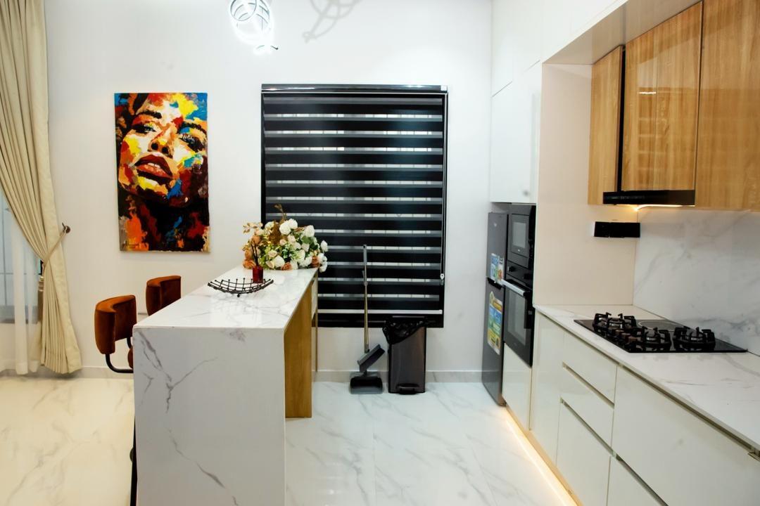 Kitchen with a waterfall marble island, oak and white cabinetry and a bold portrait artwork